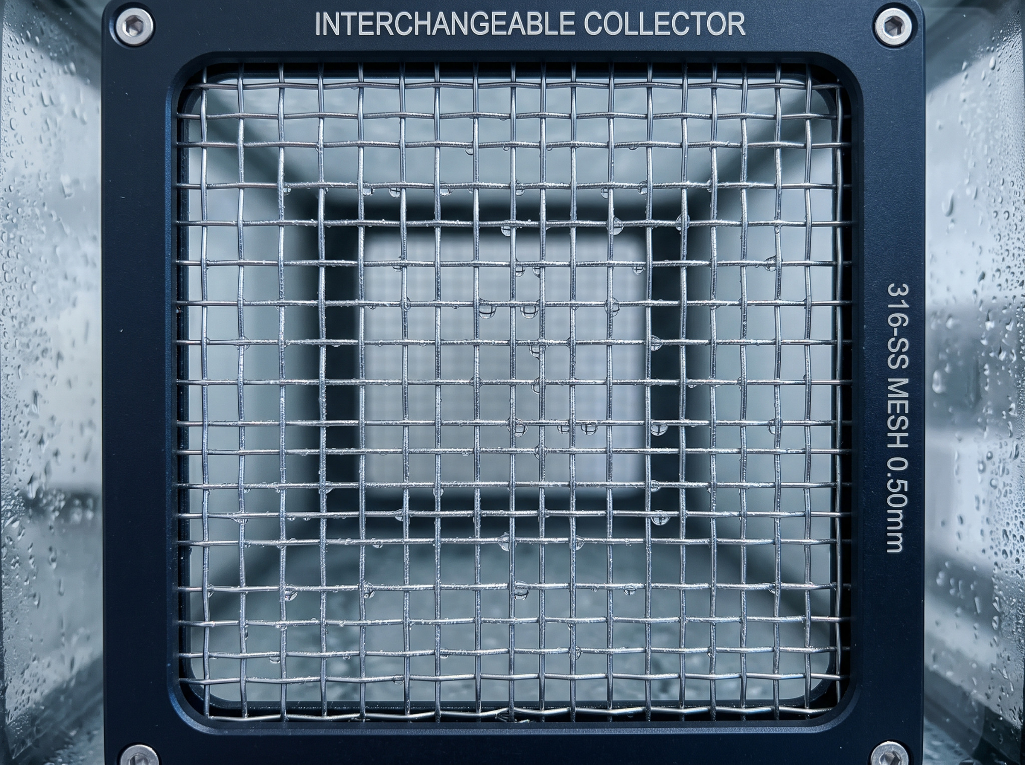 Concept macro of water droplets on a collector mesh
